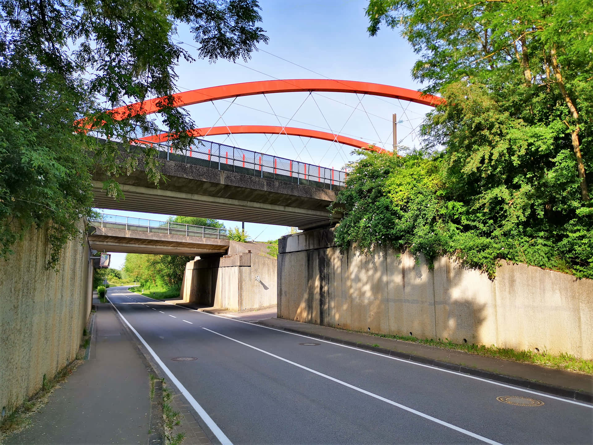 Red Pedestrian Bridge Over Road Schifflange Wallpaper