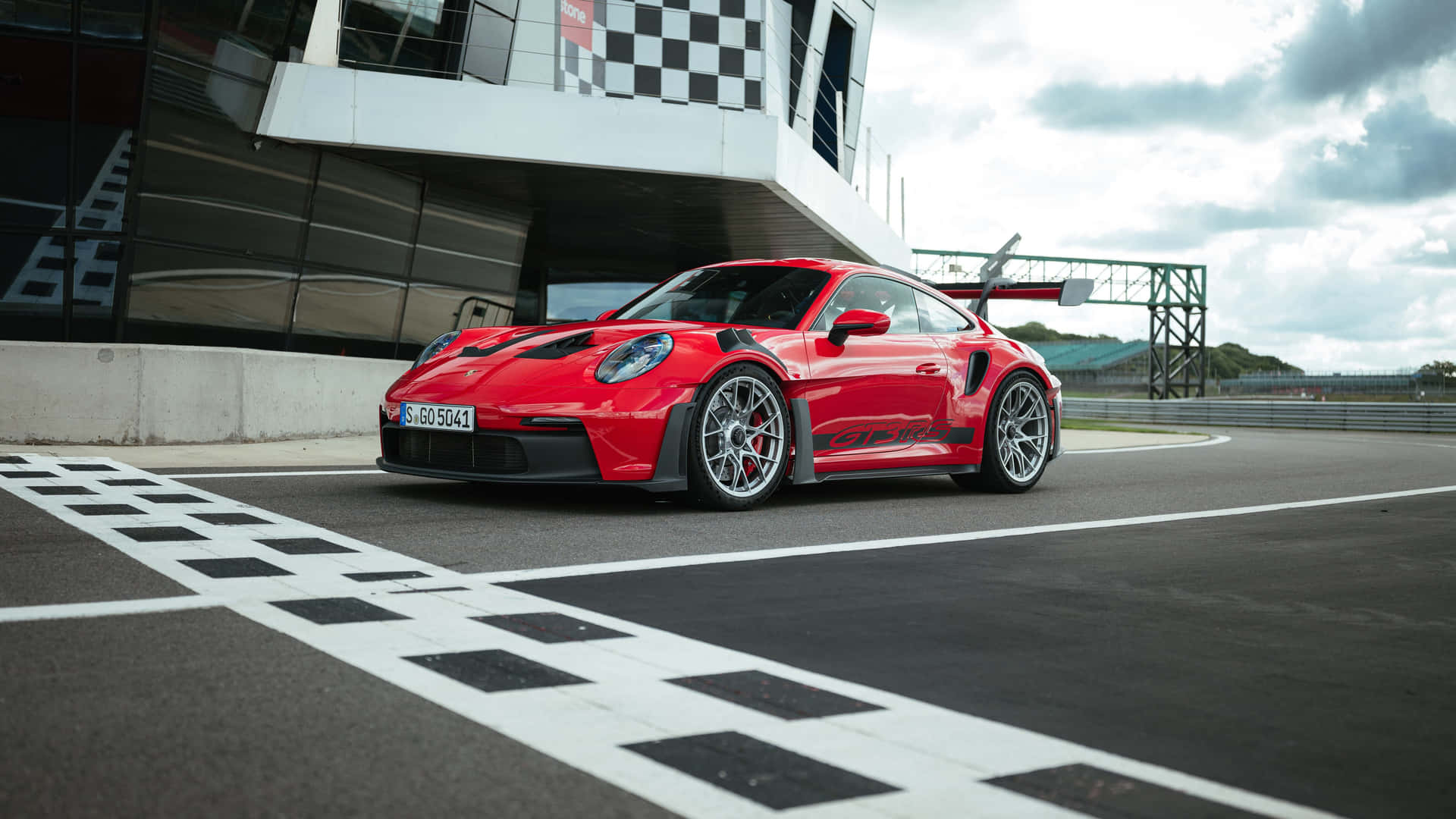 Red Porsche911 G T3 R Sat Racetrack Finish Line Wallpaper