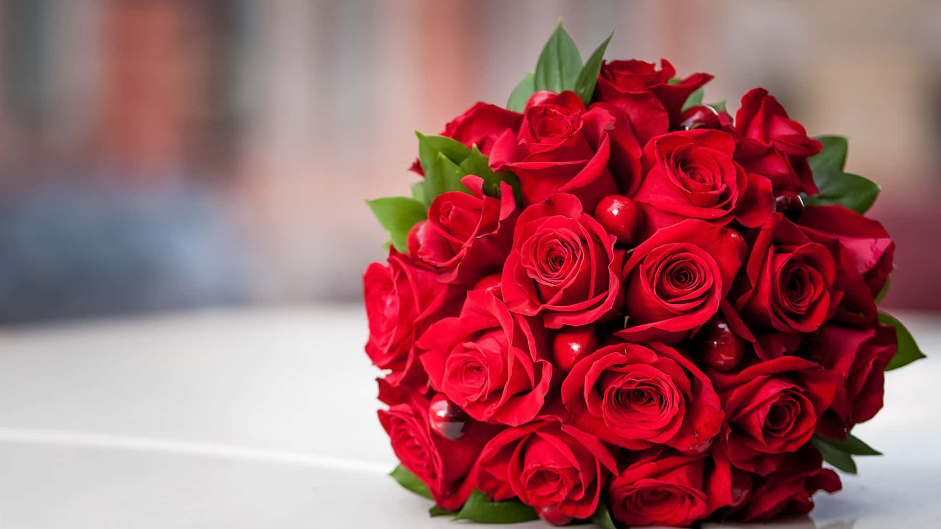 Red Rose Bouquet With Red Balls Decoration Wallpaper