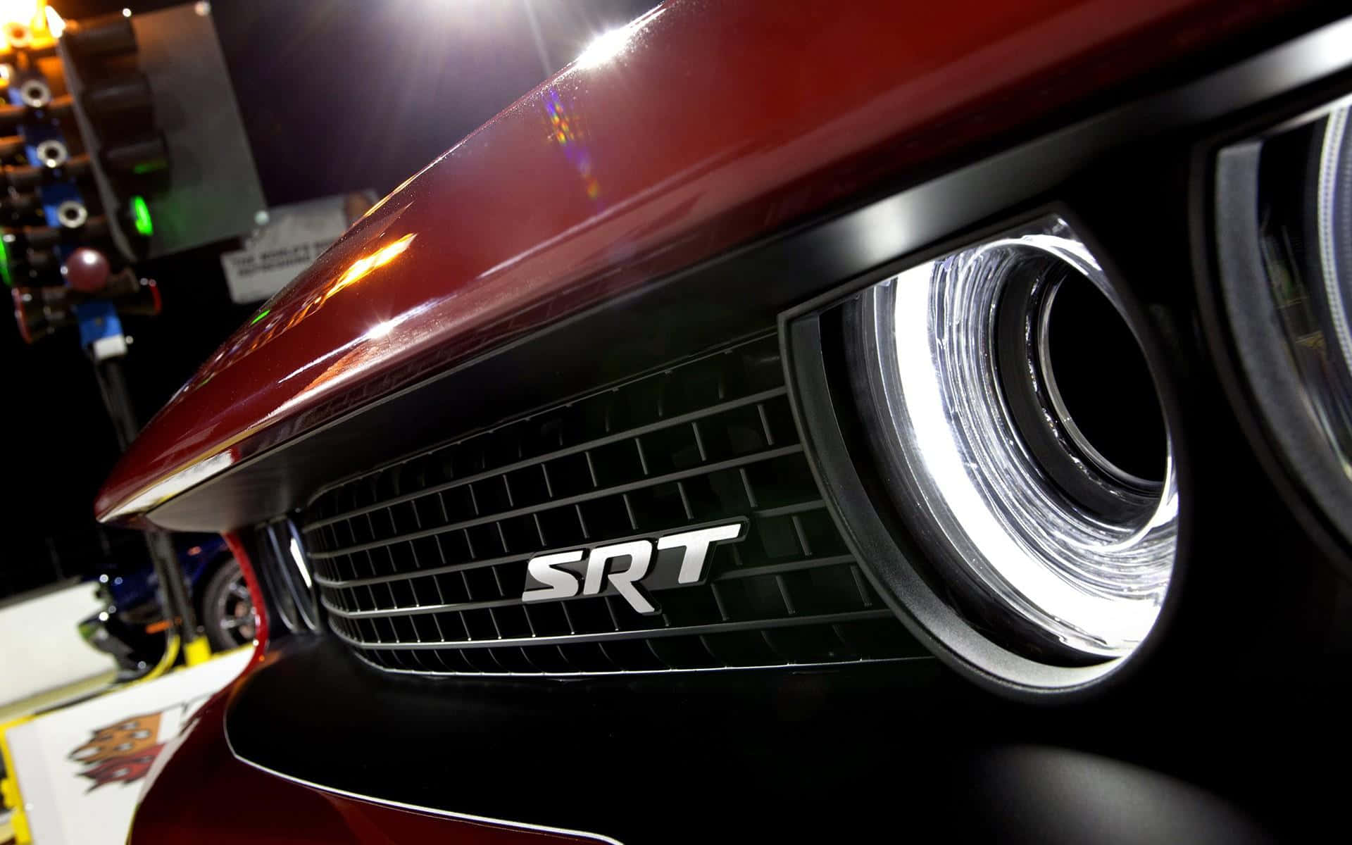 Red S R T Vehicle Grilleand Headlight Wallpaper