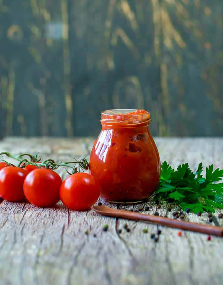 Delicious Red Sauce in a glass jar Wallpaper