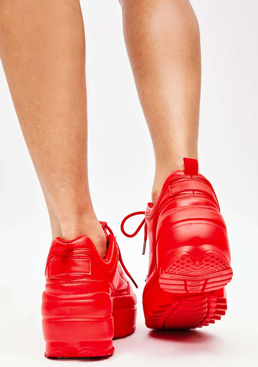 Woman Wearing Stylish Red Shoes Wallpaper