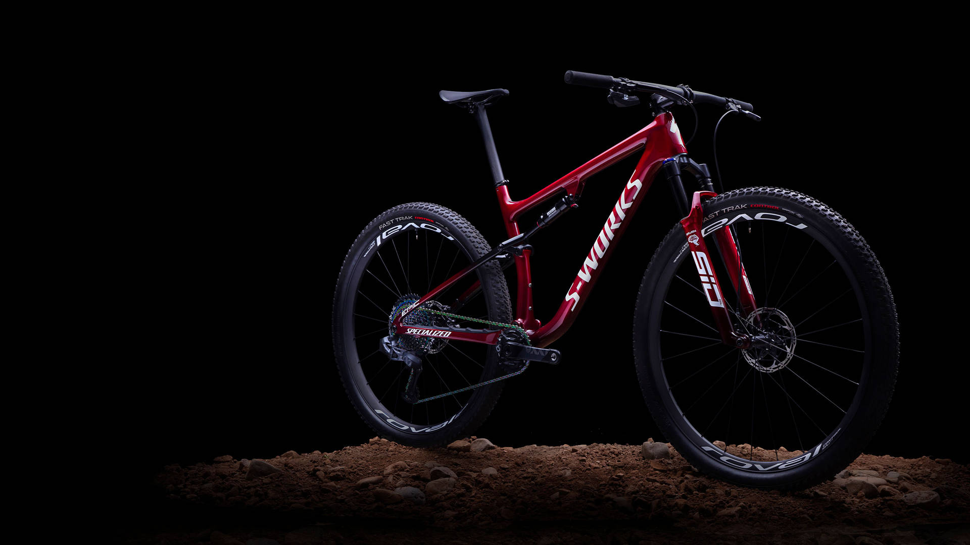 Rotesspecialized-fahrrad In Der Dunkelheit Wallpaper