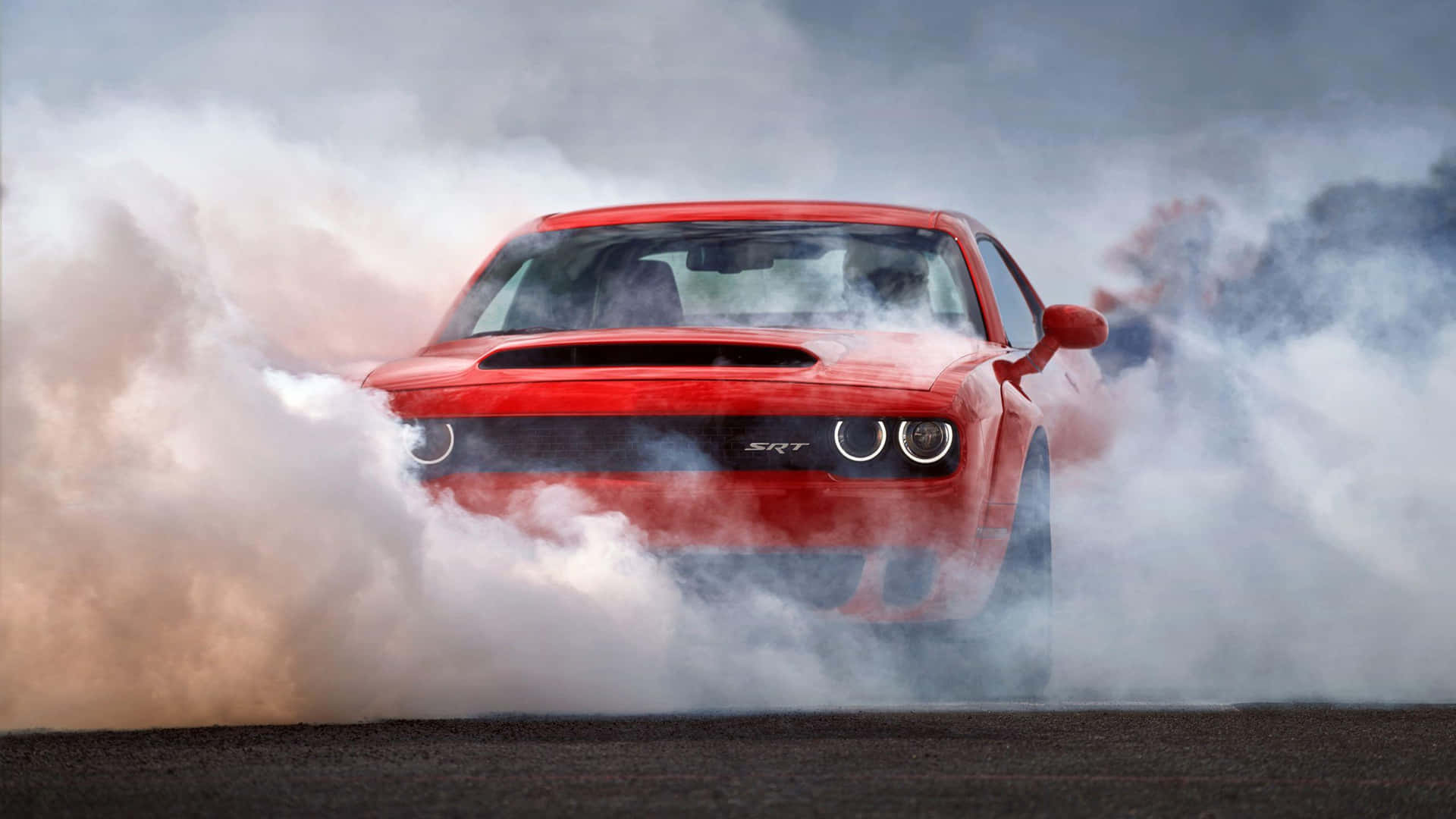 Red Sports Car Burning Rubber Wallpaper