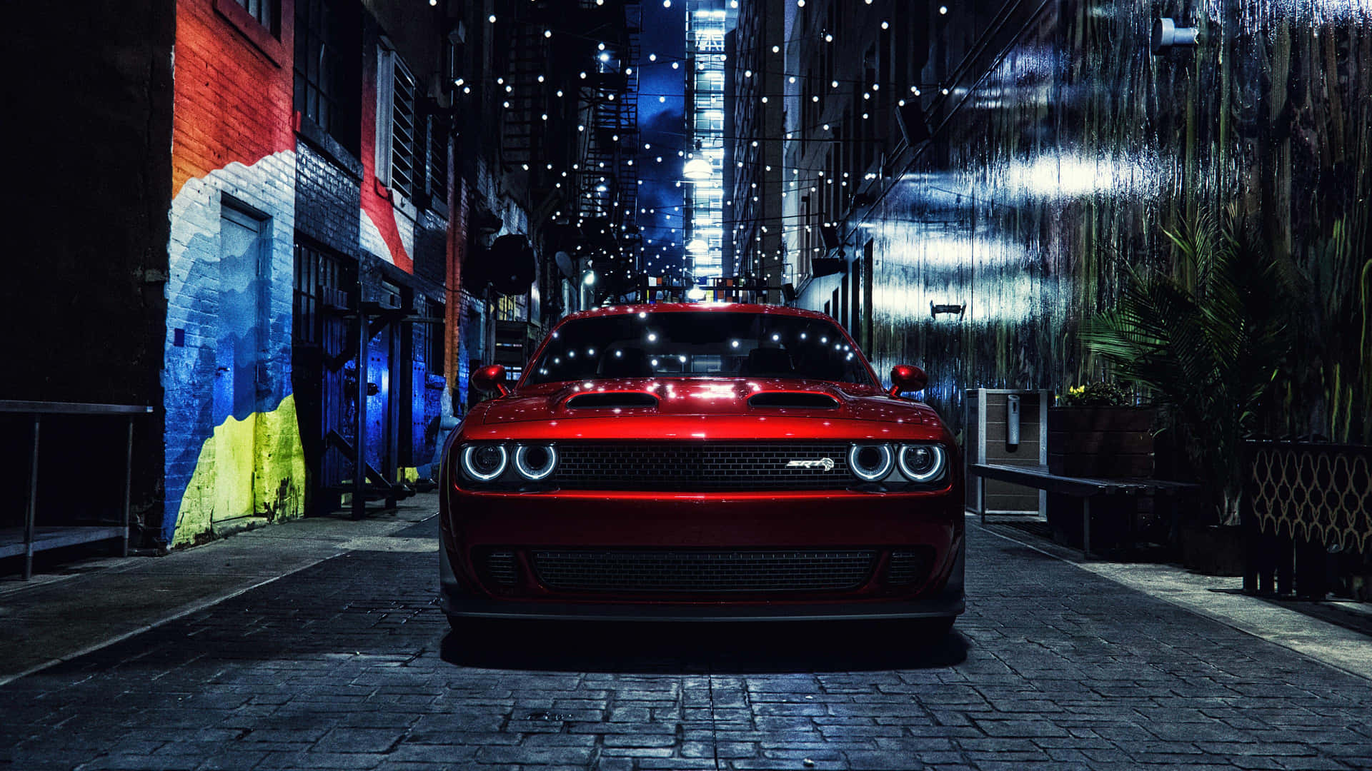 Red Sports Car Urban Night Scene.jpg Wallpaper