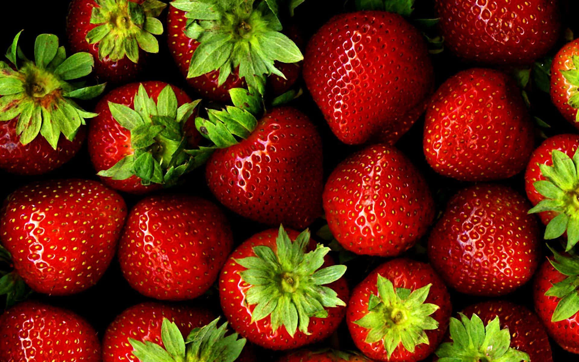 Juicy Red Strawberry on a White Background Wallpaper