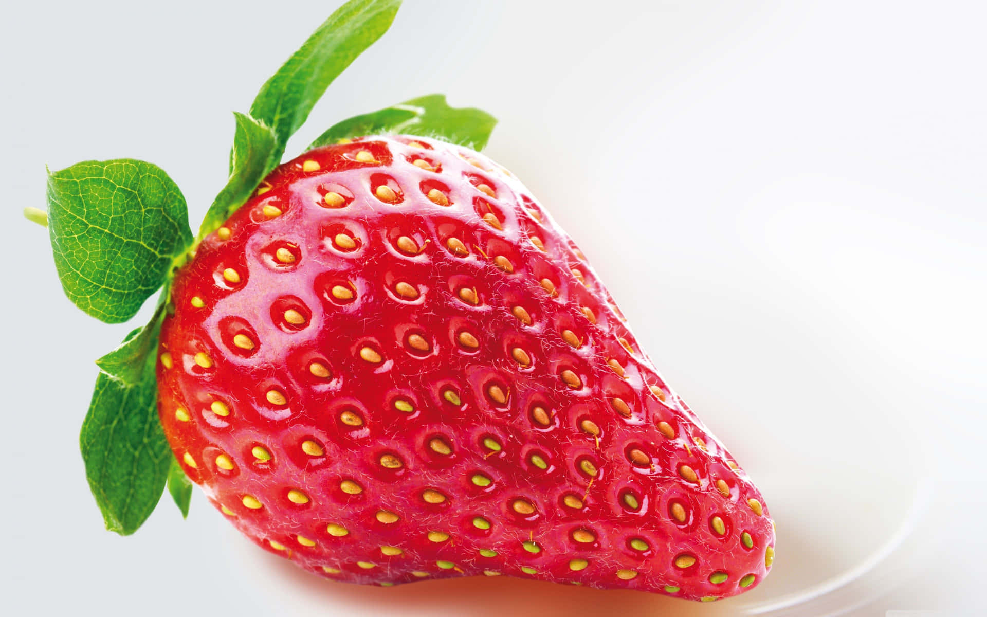 Caption: Fresh and Juicy Red Strawberries Wallpaper