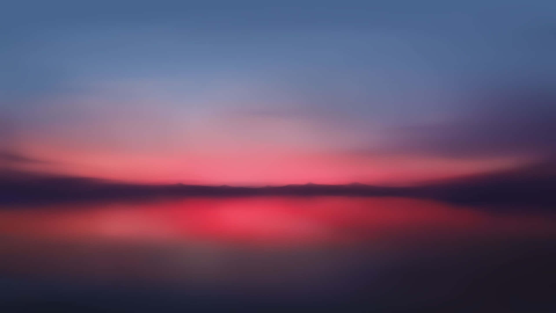 Enchanting Red Sunset Over the Horizon Wallpaper