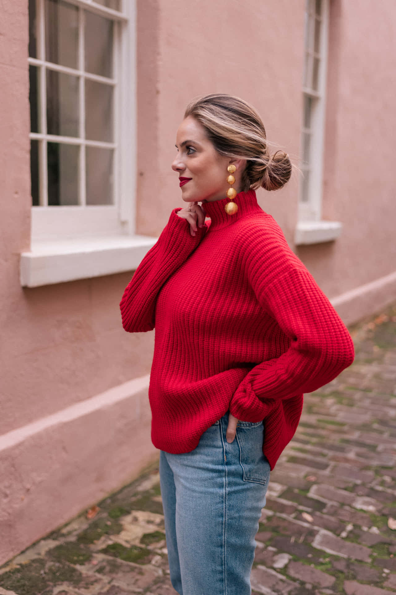 Woman in Stylish Red Sweater Wallpaper