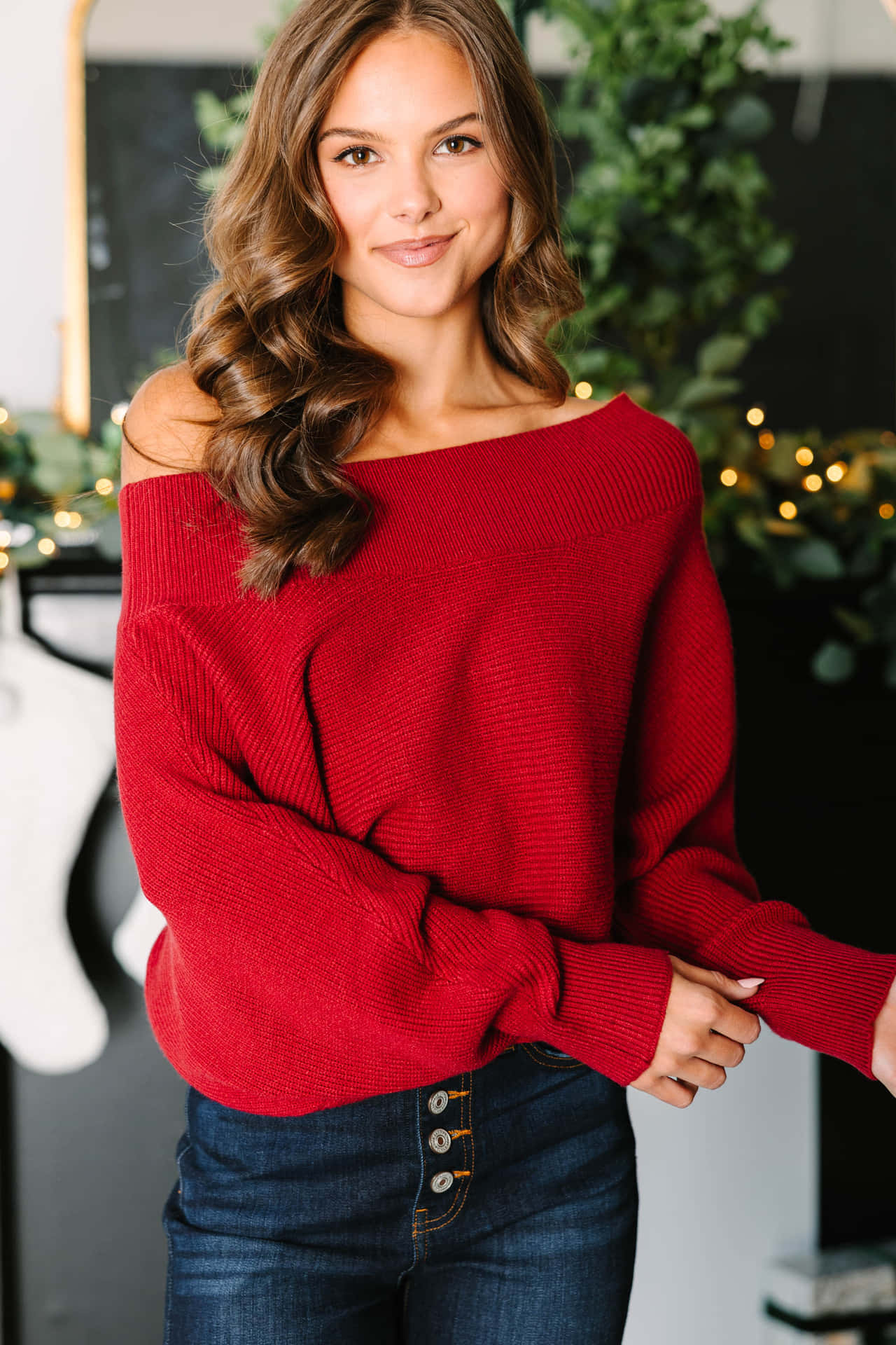 Stylish Red Sweater on a Wooden Hanger Wallpaper