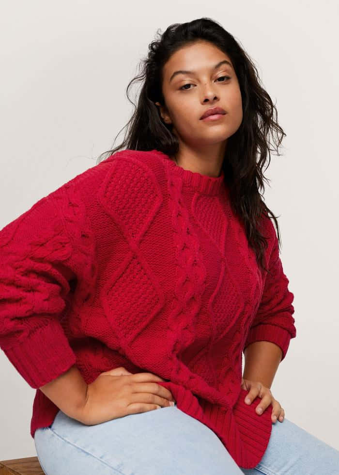 Woman wearing a cozy red sweater Wallpaper