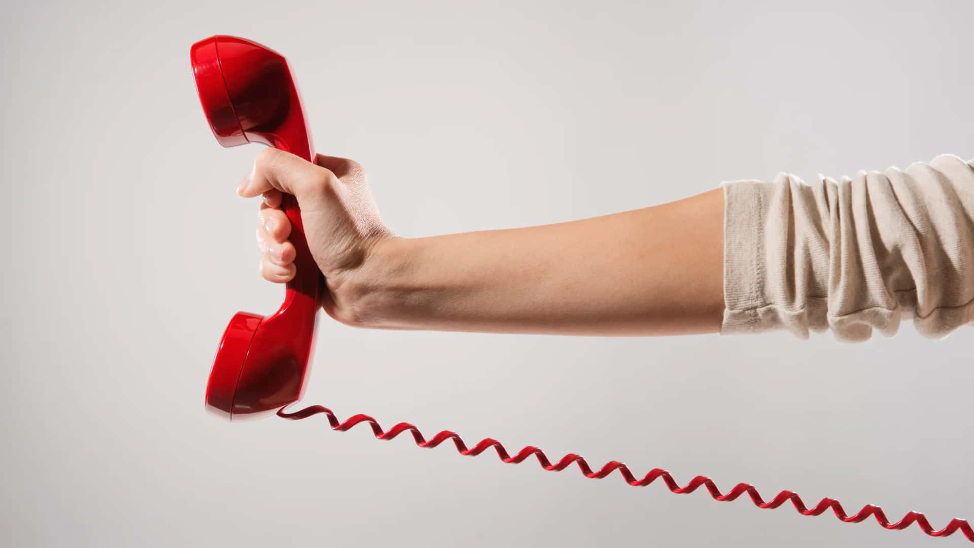 Red Telephone Hand Holding Wallpaper