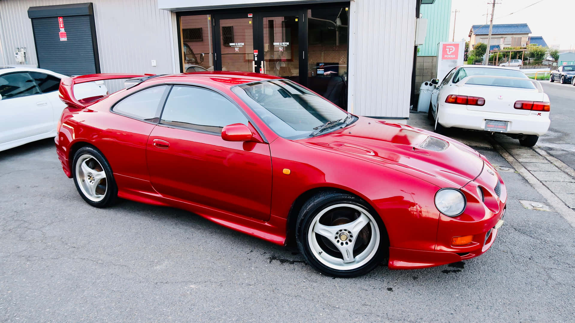 Rode Toyota Celica G T Four Geparkeerd Achtergrond