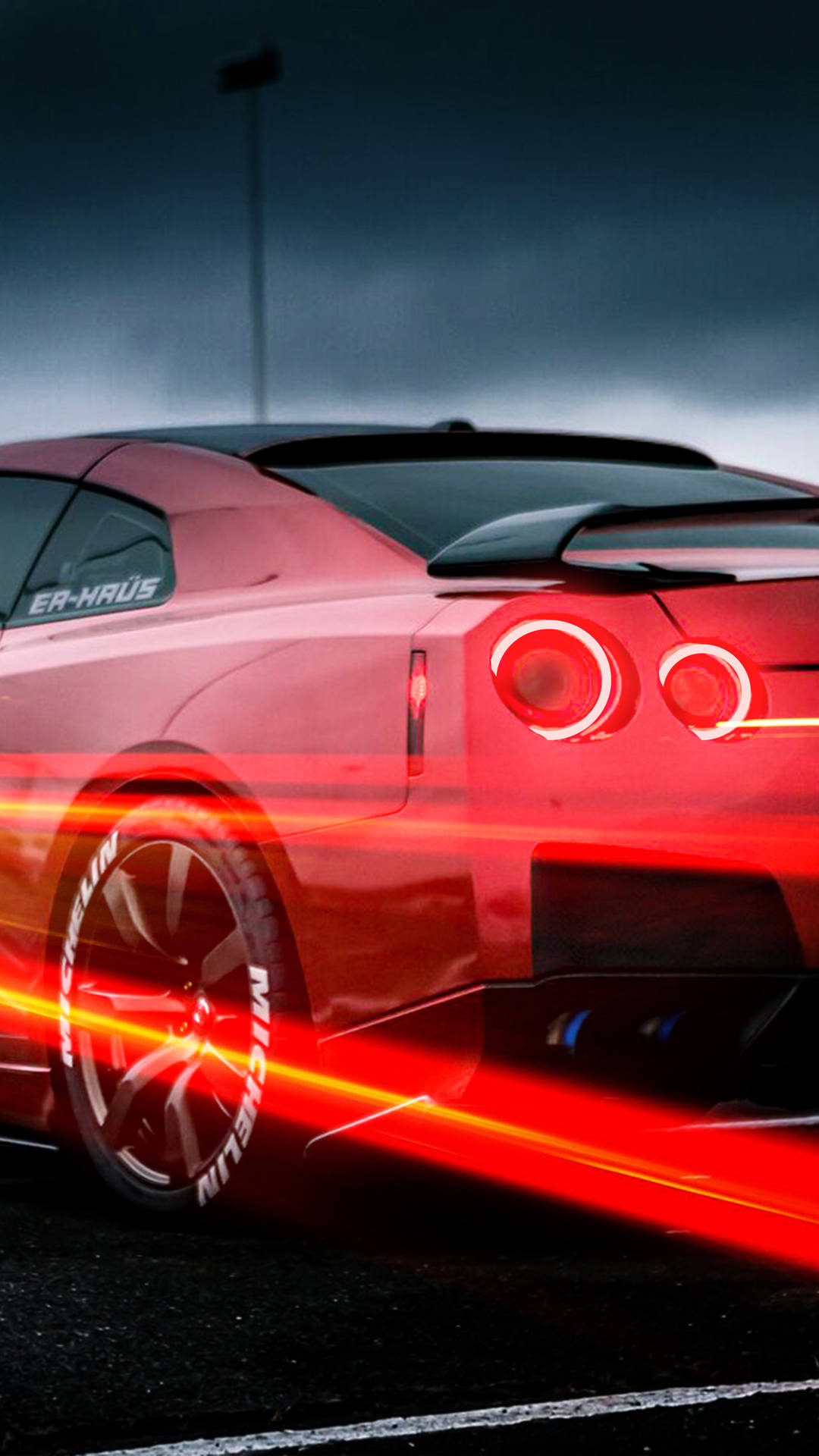 Download Red Trail Lights On Red 4k Car Iphone Wallpaper 