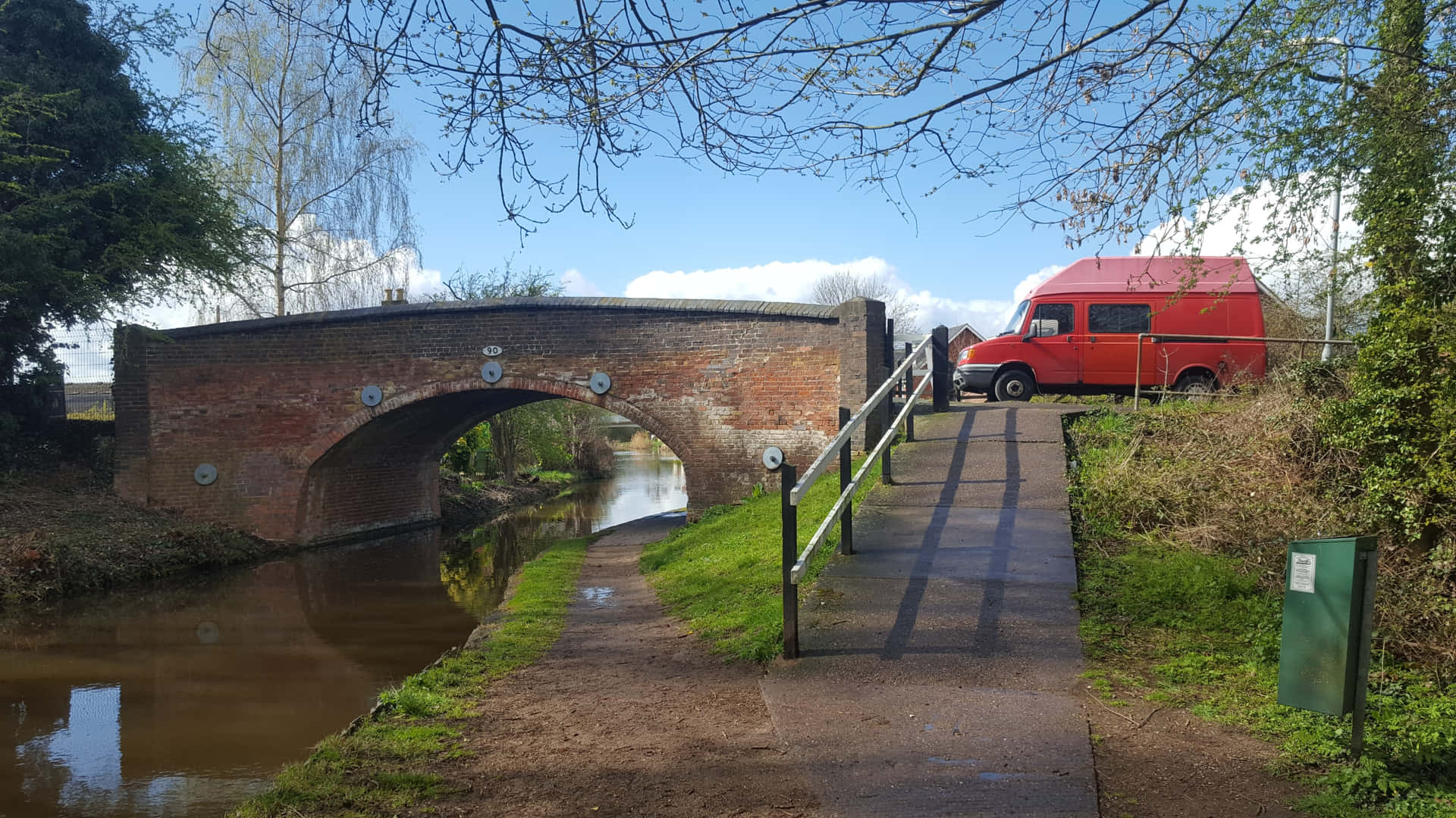 Red Van Near Brick Bridge Canal Path Wallpaper