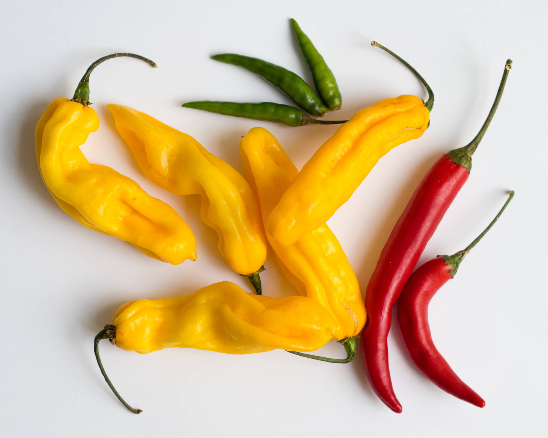 Red Yellow And Green Chili Pepper Fruits Wallpaper