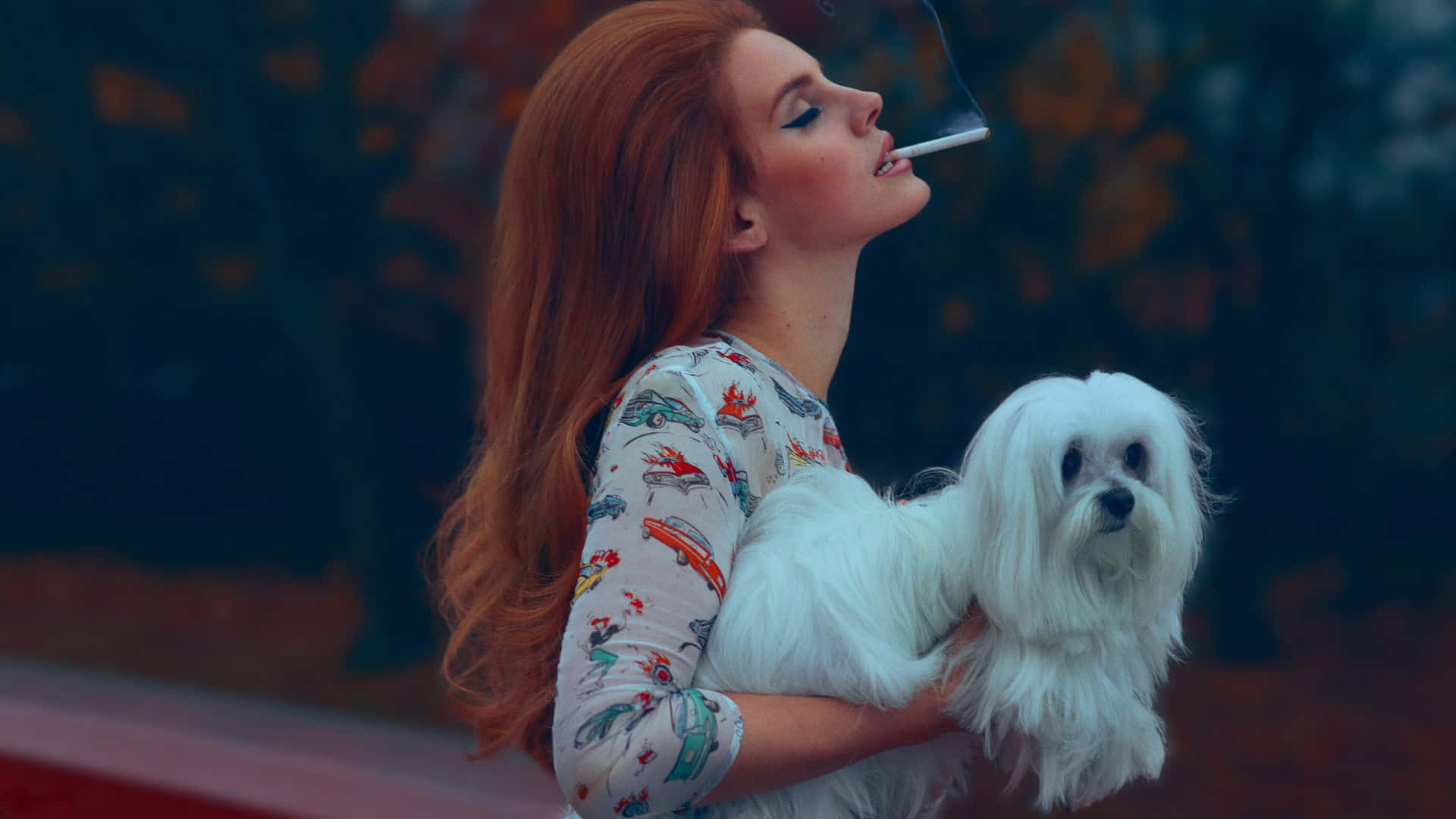 Redhead Woman Holding Dog Smoking Wallpaper