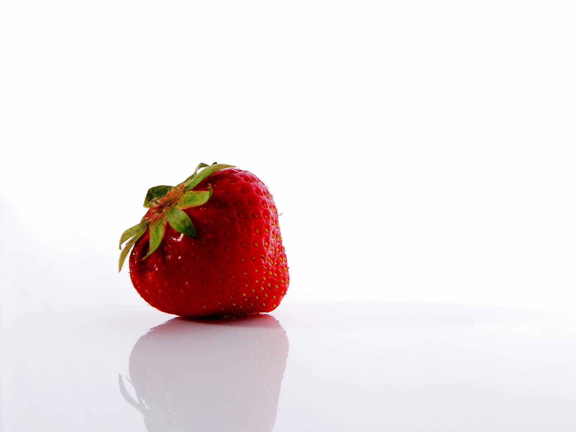 Reflecting Red Strawberry Desktop Wallpaper