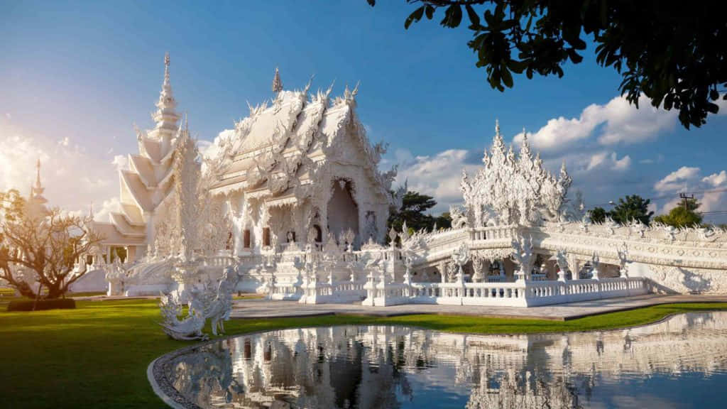 Reflection In Front Of White Temple In Chiang Rai Wallpaper