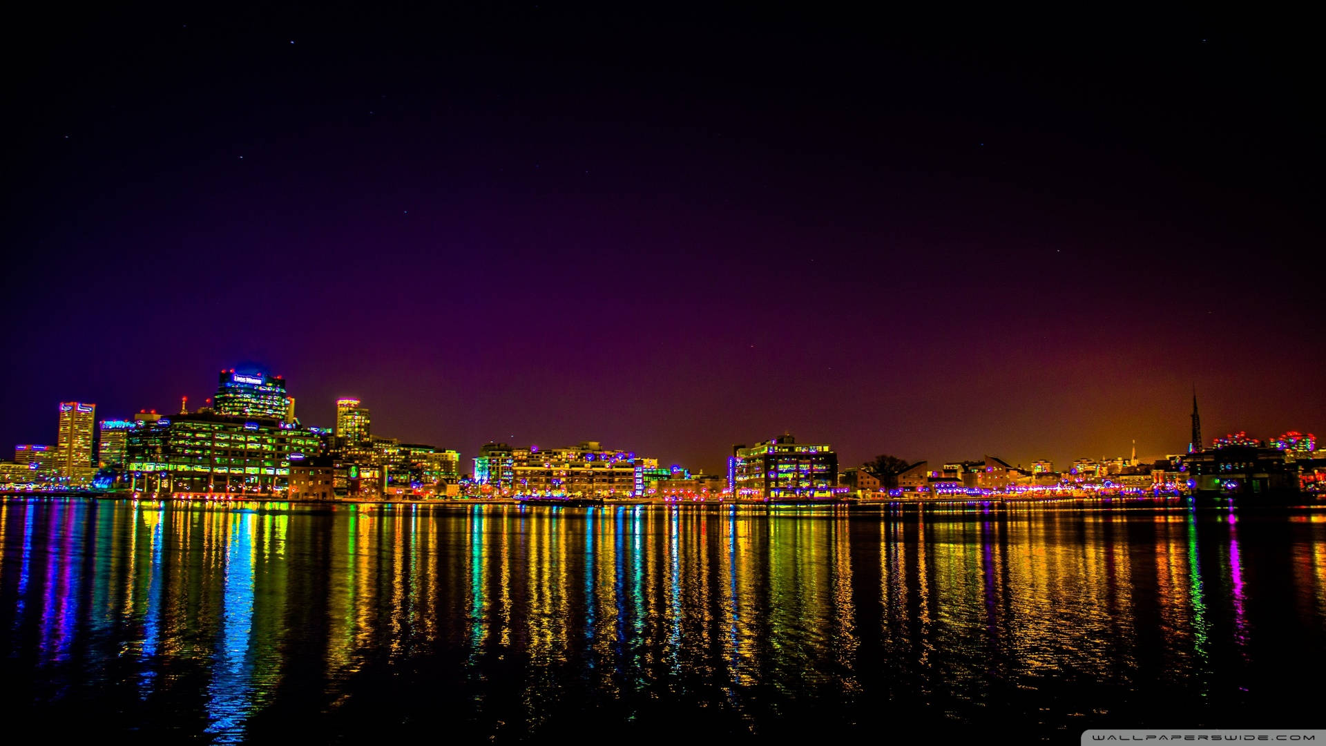 Reflection Of Colorful Lights In Baltimore Lake Wallpaper