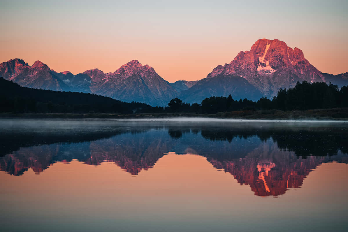 Imagende La Cordillera Teton Reflejada En Un Lago