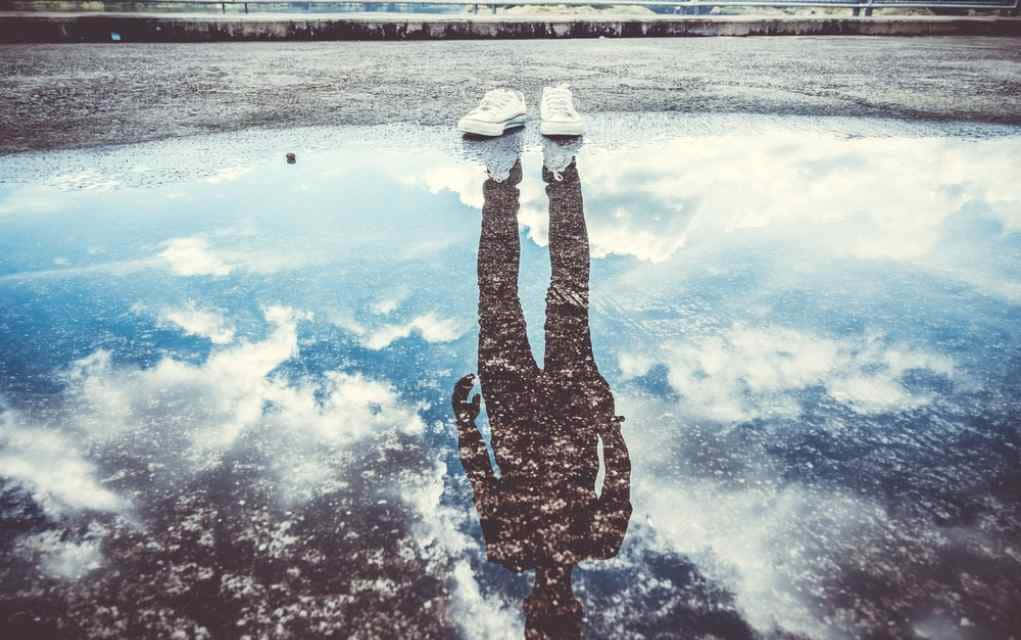 Person Reflection In Puddle Picture