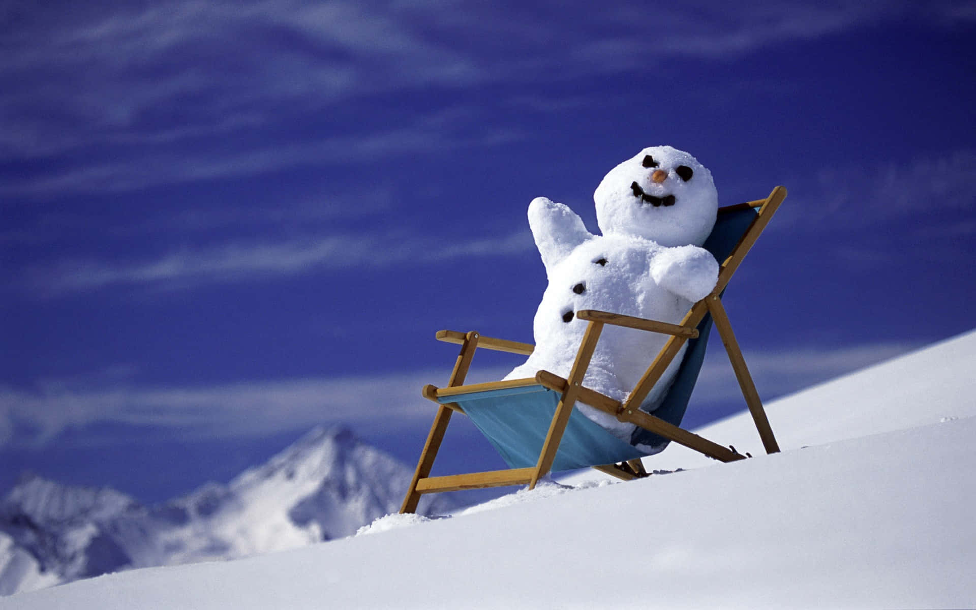 Relaxed Snowman Mountain View.jpg Wallpaper