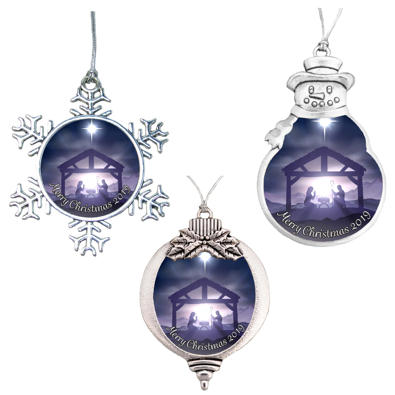 Three Christmas Ornaments With A Nativity Scene