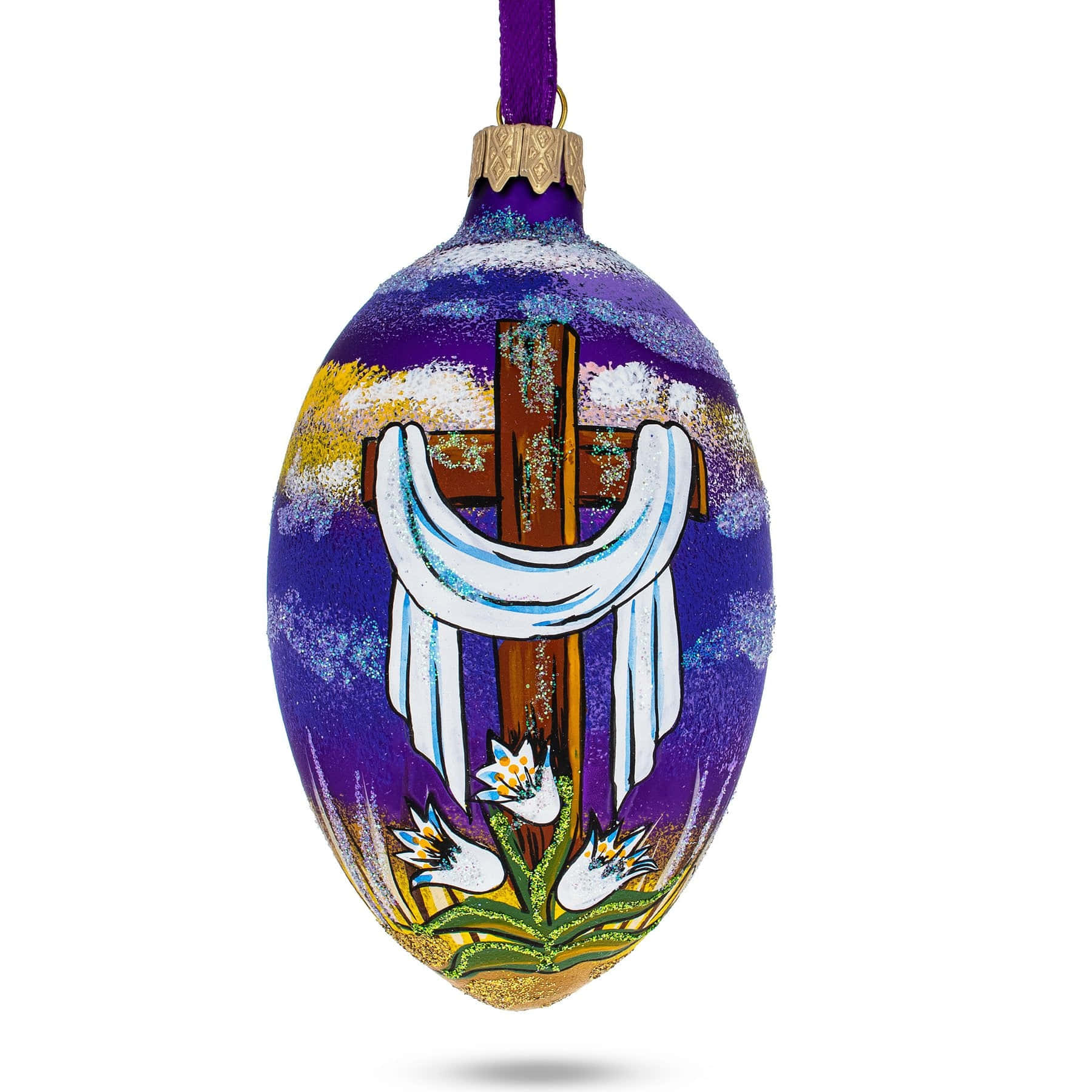 A Purple Glass Ornament With A Cross And Flowers