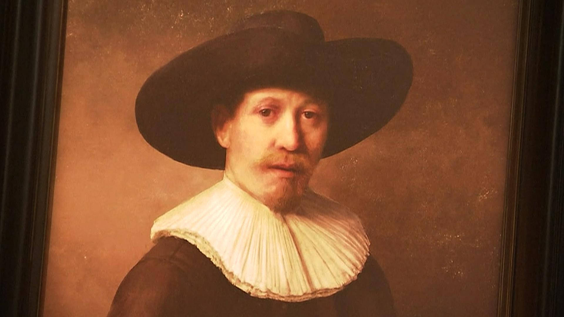Rembrandt maleri af mand i pels hætte. Wallpaper