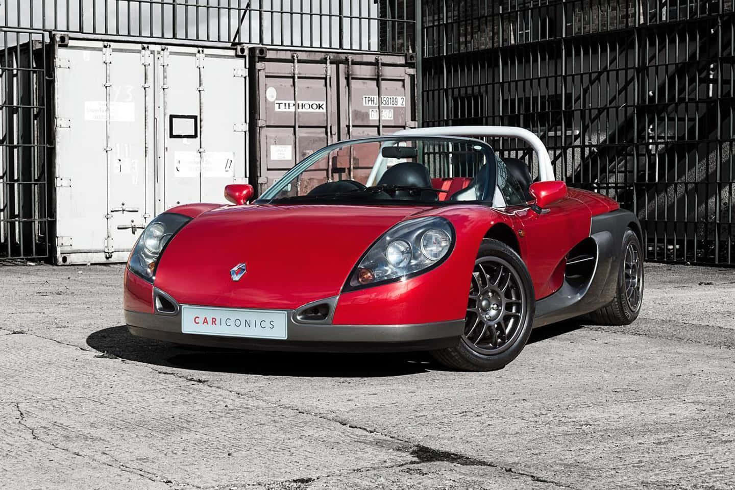 Sleek Renault Sport Spider on an open road Wallpaper