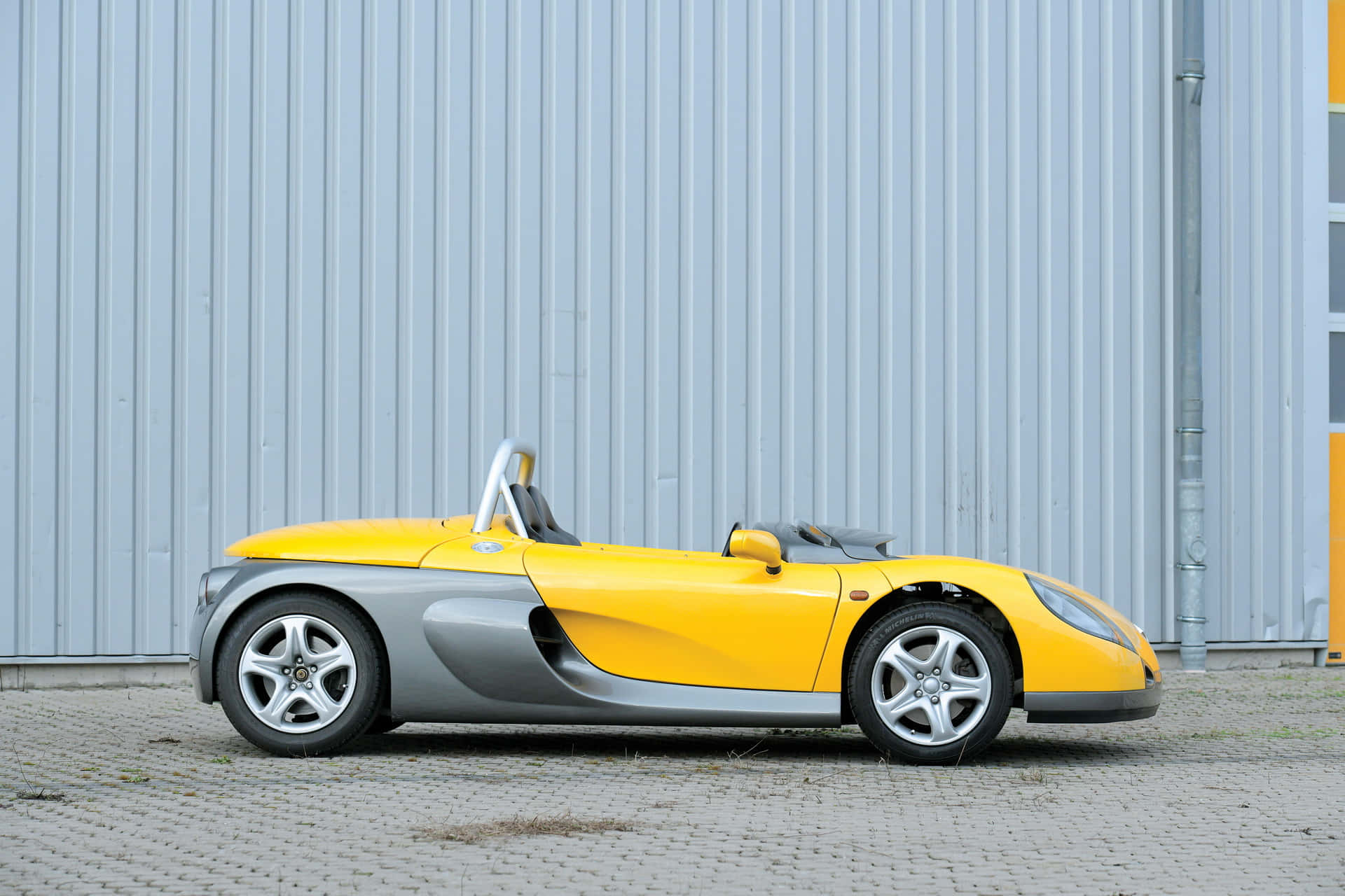 A stunning Renault Sport Spider showcased on the racetrack. Wallpaper