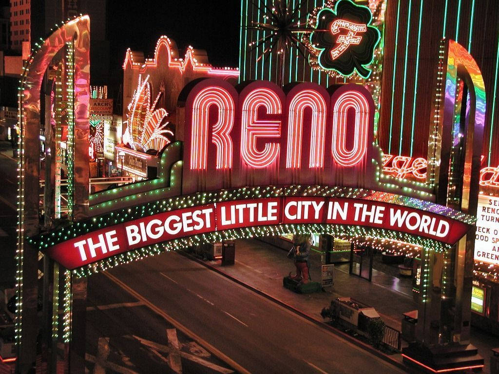 The City of Reno illuminated at night Wallpaper