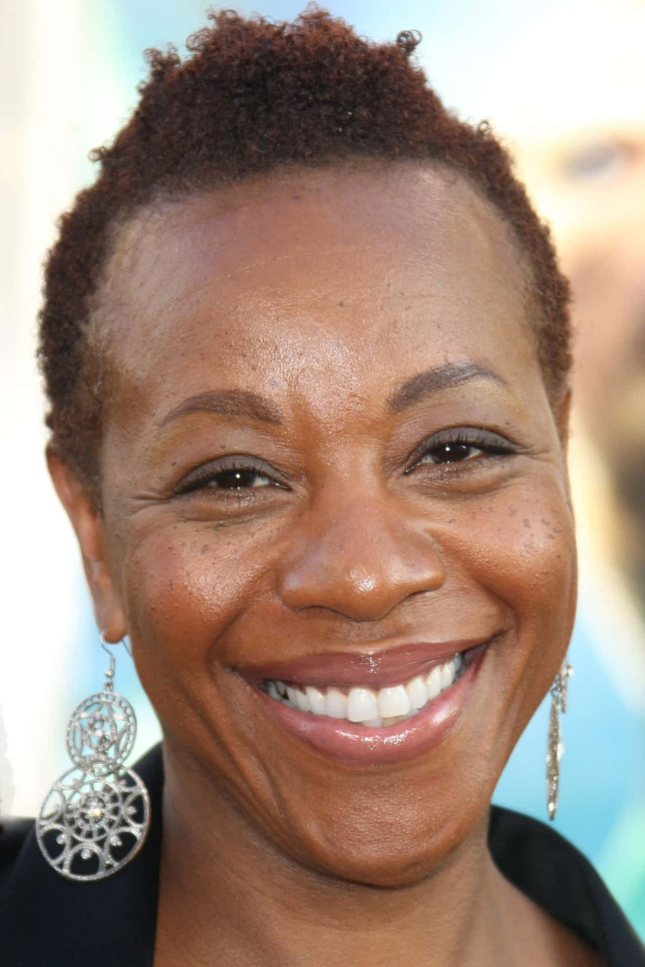 Renowned Actress Marianne Jean-baptiste In A Fashionable Outfit Wallpaper