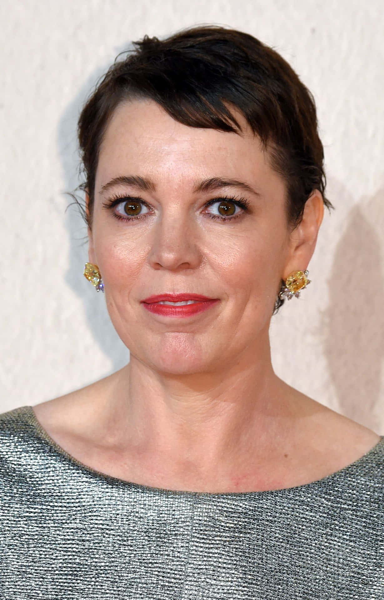 Renowned Actress Olivia Colman In An Elegant Outfit Wallpaper