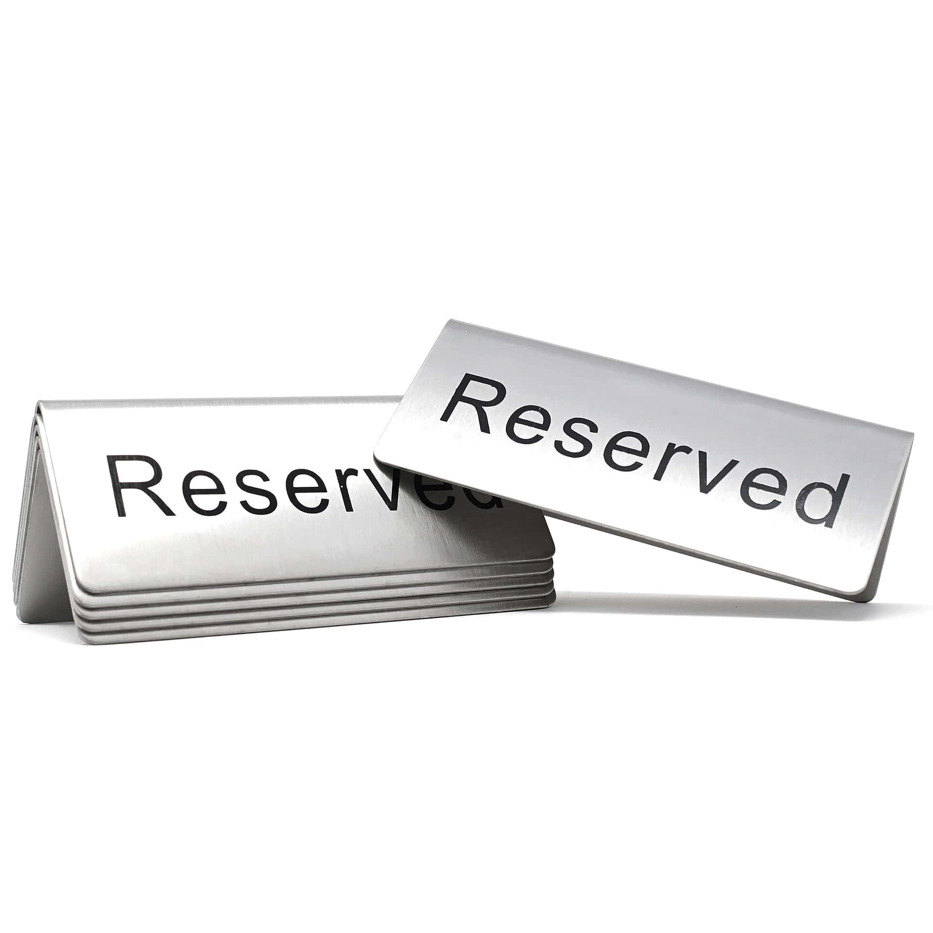 A Reserved Table Sign on a Restaurant Dining Table Wallpaper