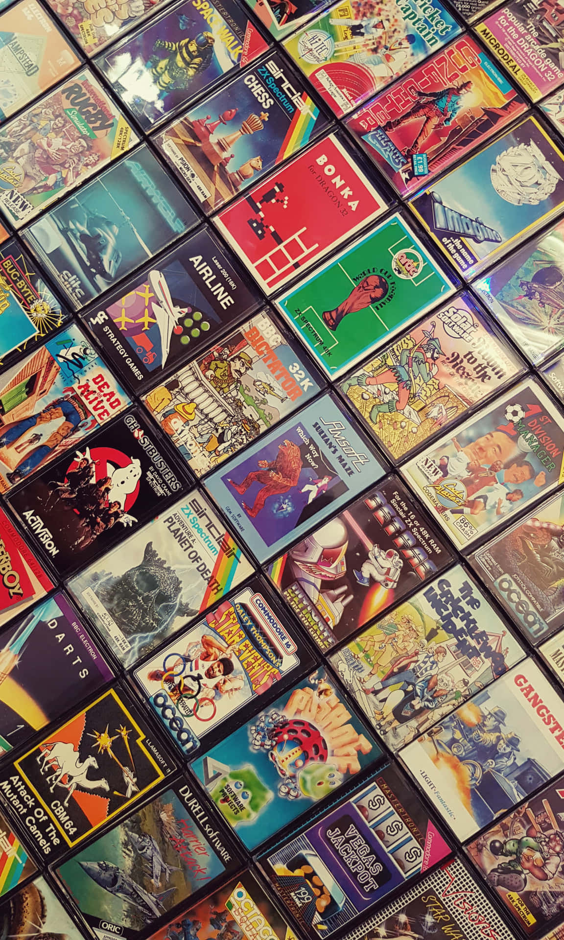 A Collection Of Video Game Cartridges Wallpaper