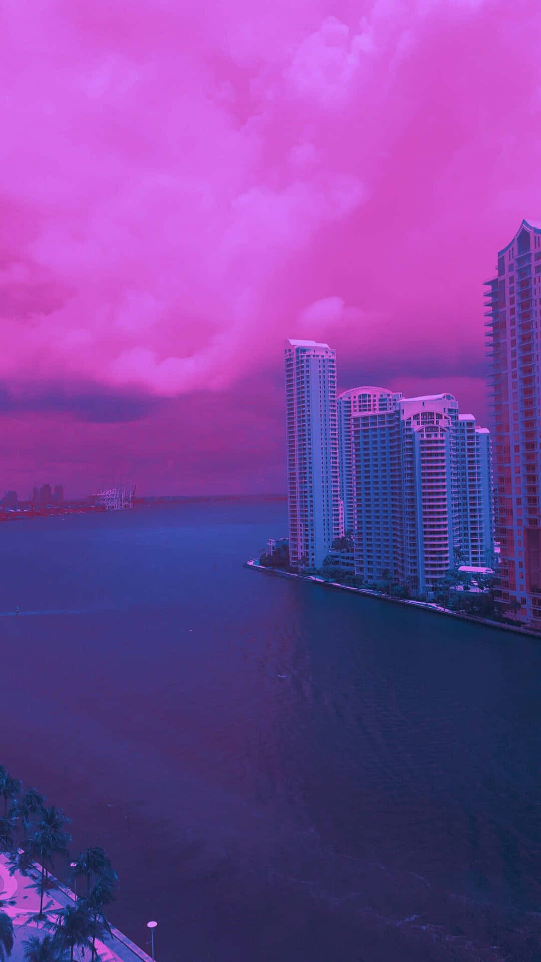 Nyd de farverige retro vibrationer fra Miami i dette dynamiske tapet. Wallpaper