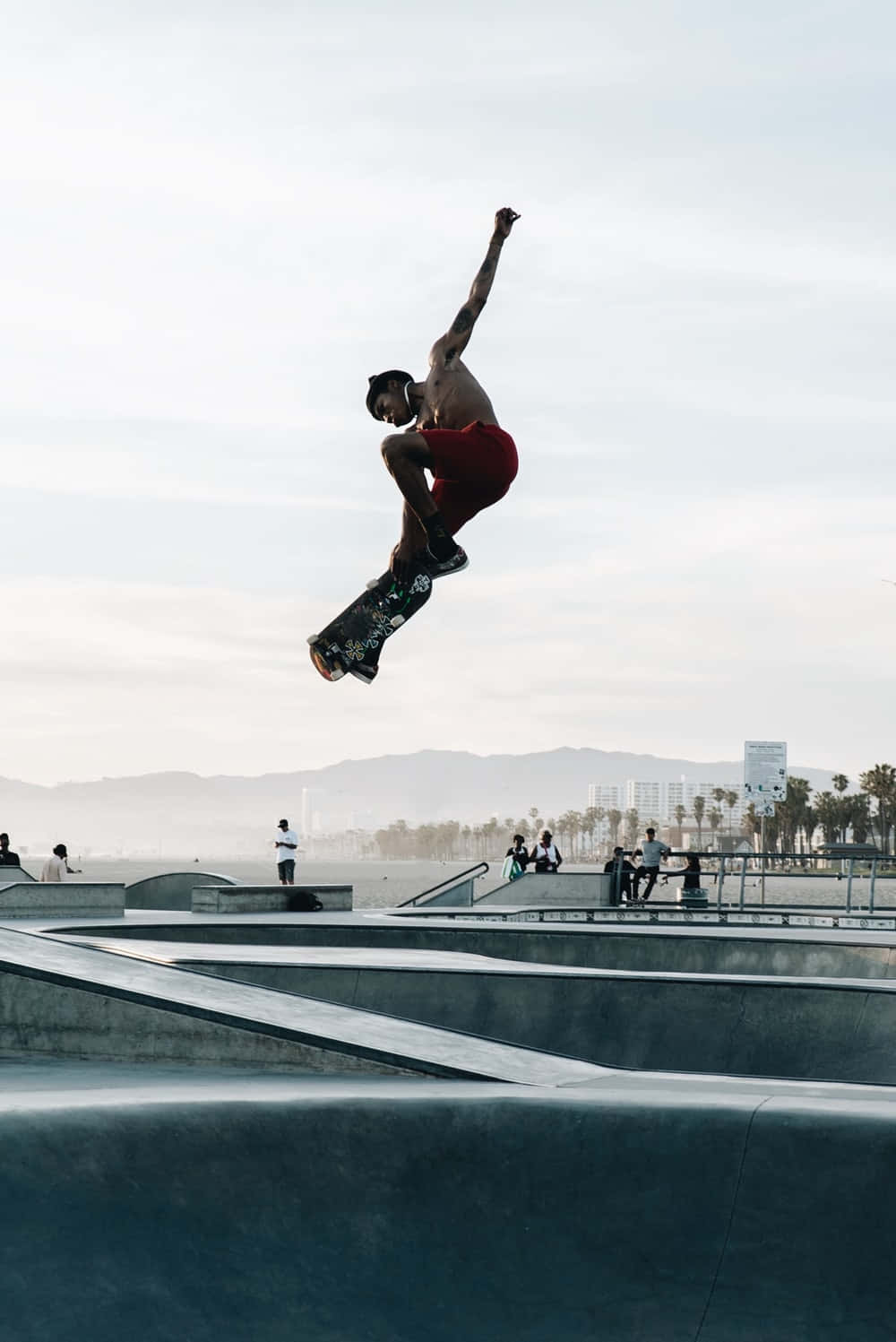 Einskateboarder In Der Luft Wallpaper