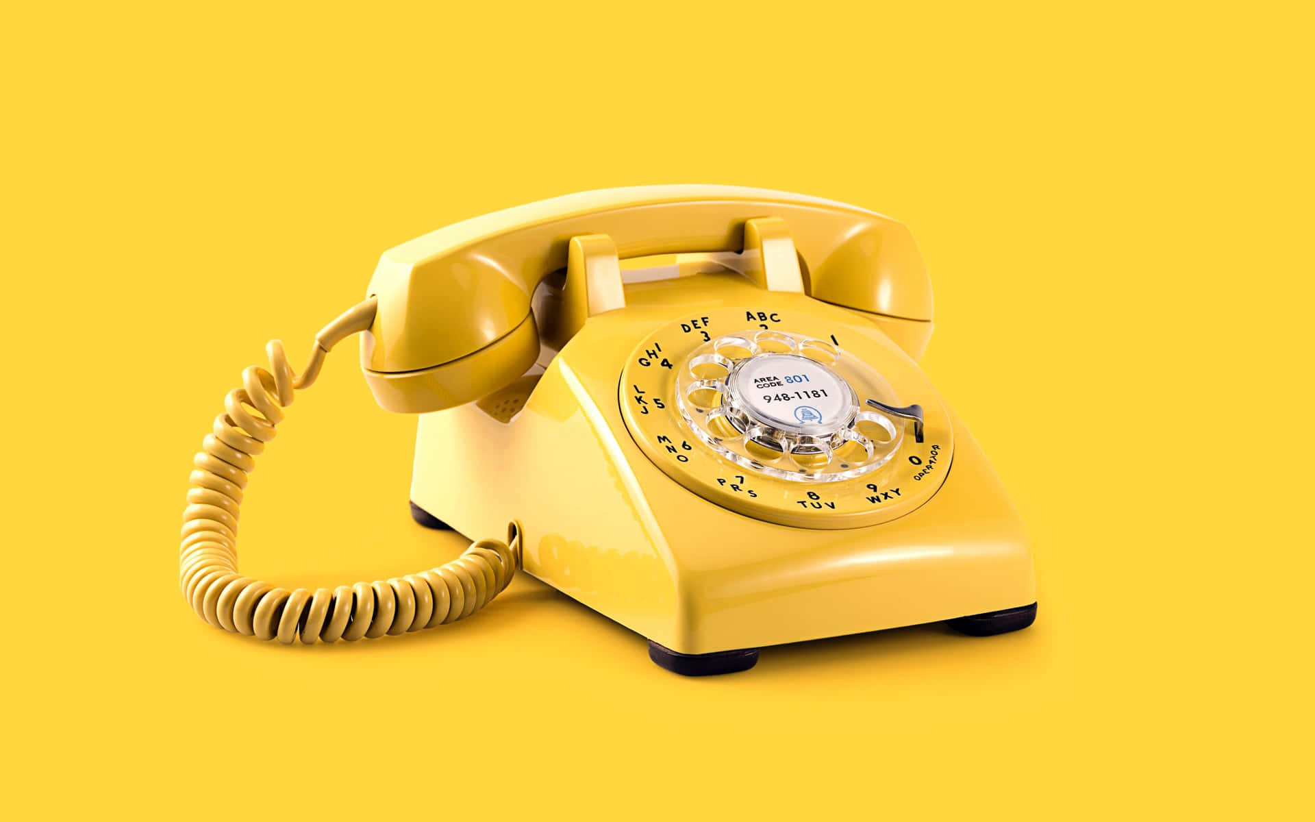 Gul telefon på en gul baggrund Wallpaper