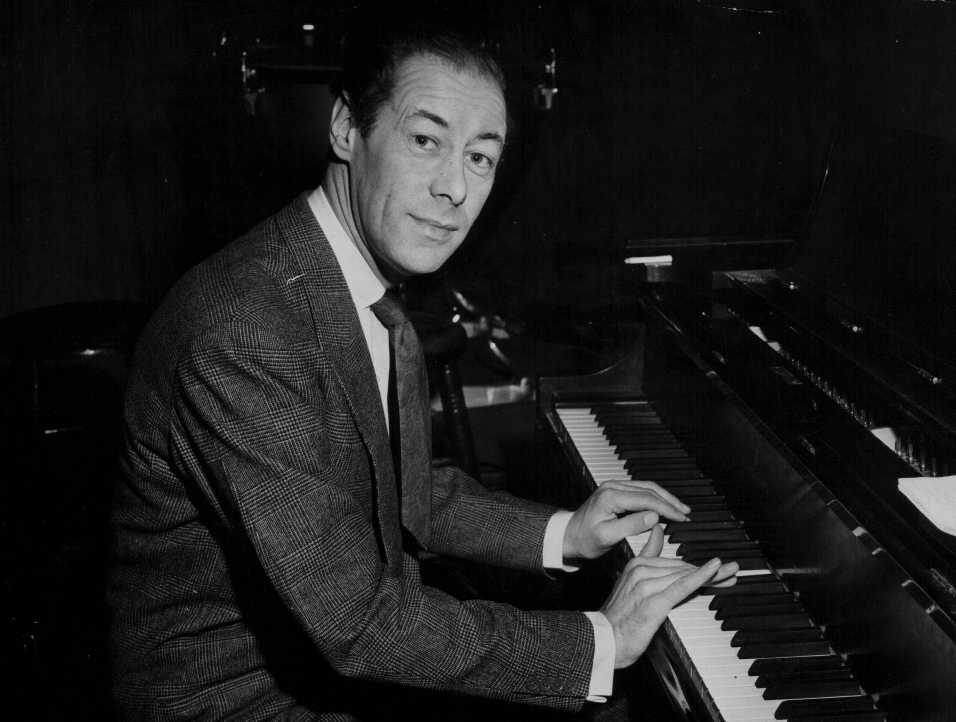 Rex Harrison Playing The Piano Wallpaper