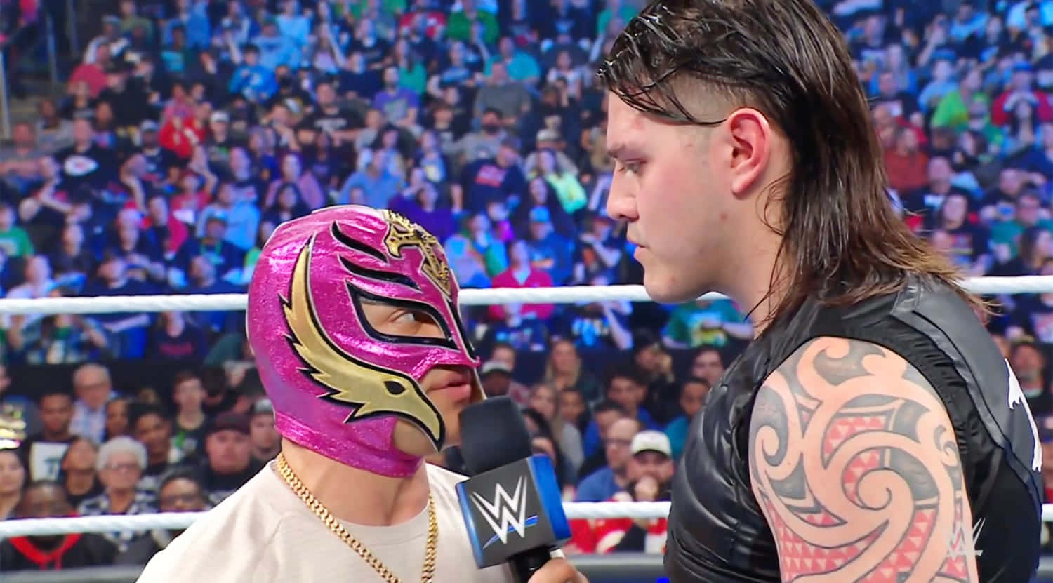 Rey Mysterio Confrontation In W W E Ring Wallpaper