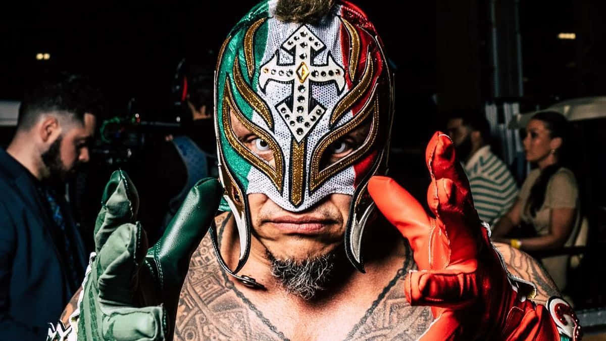 Download Rey Mysterio Luchador Pose Wallpaper | Wallpapers.com