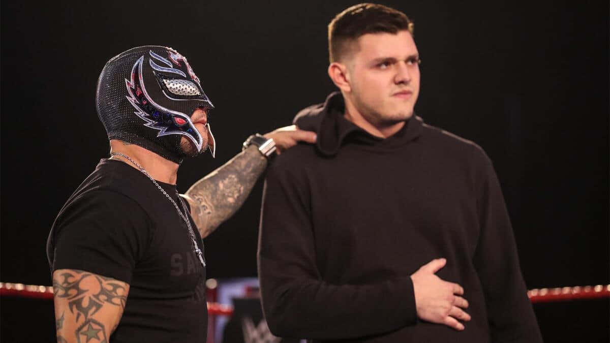 Rey Mysterio With Unmasked Individual Wallpaper