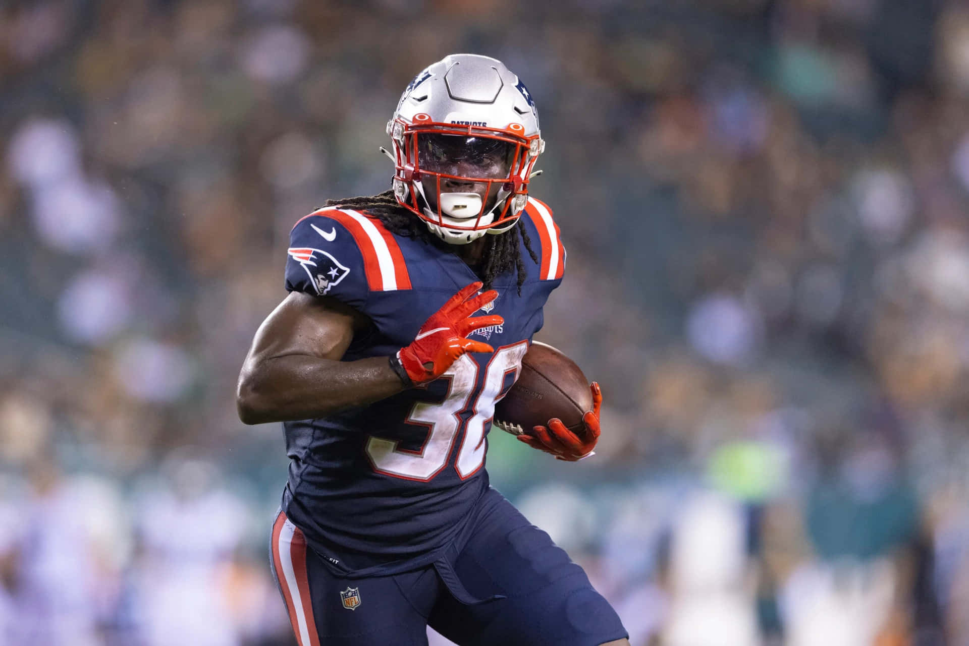 Rhamondre Stevenson Patriots Running Back Action Wallpaper