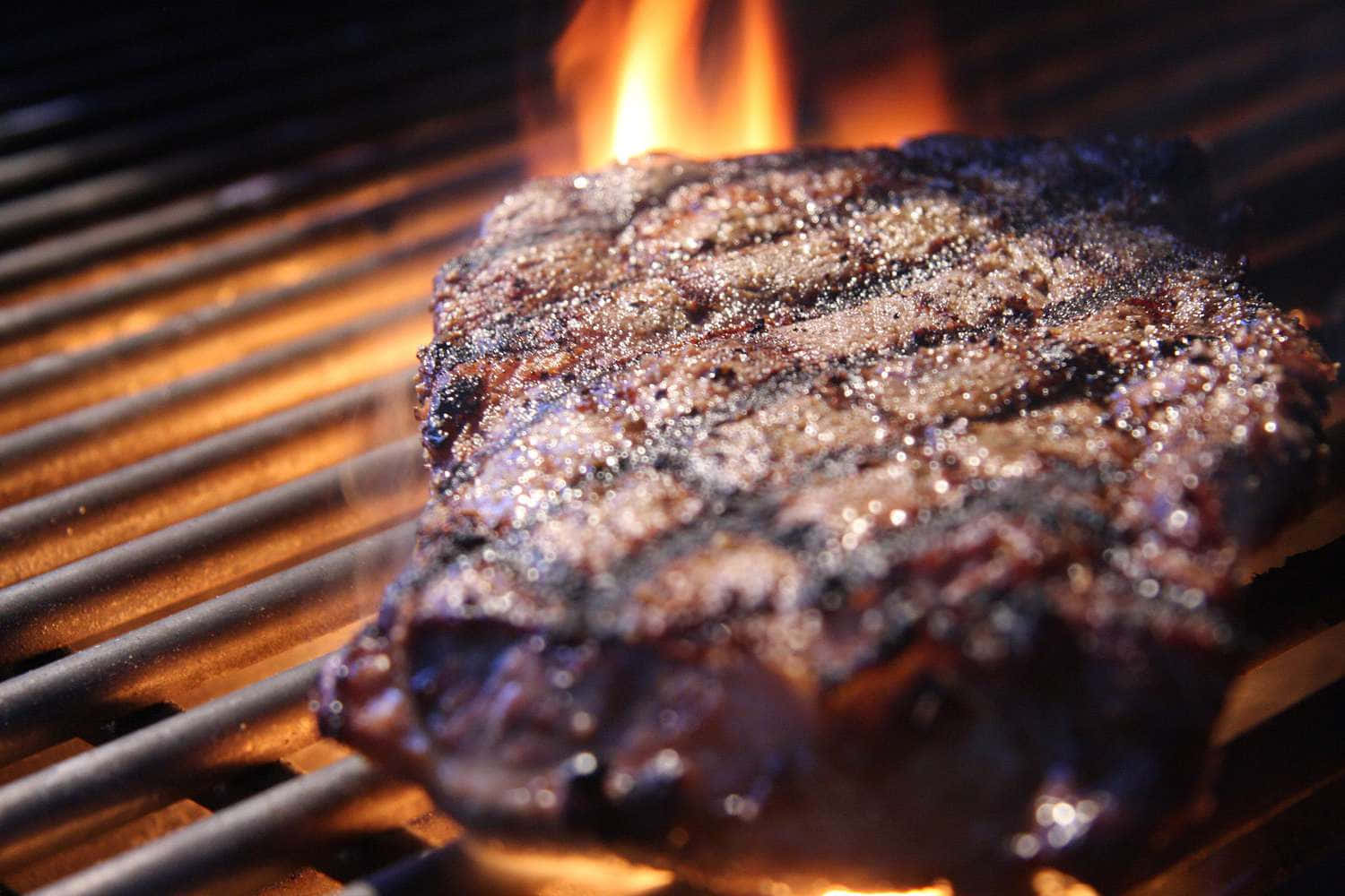 A Steak Is On A Grill