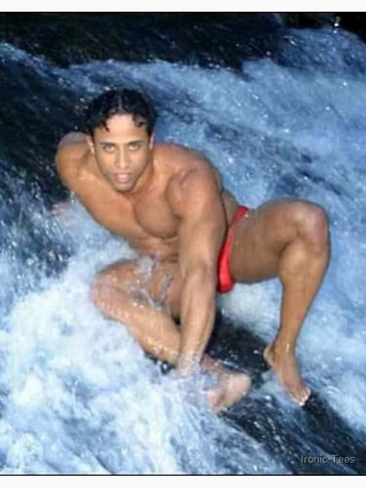 Ricardo Milos Posing In A River Wallpaper