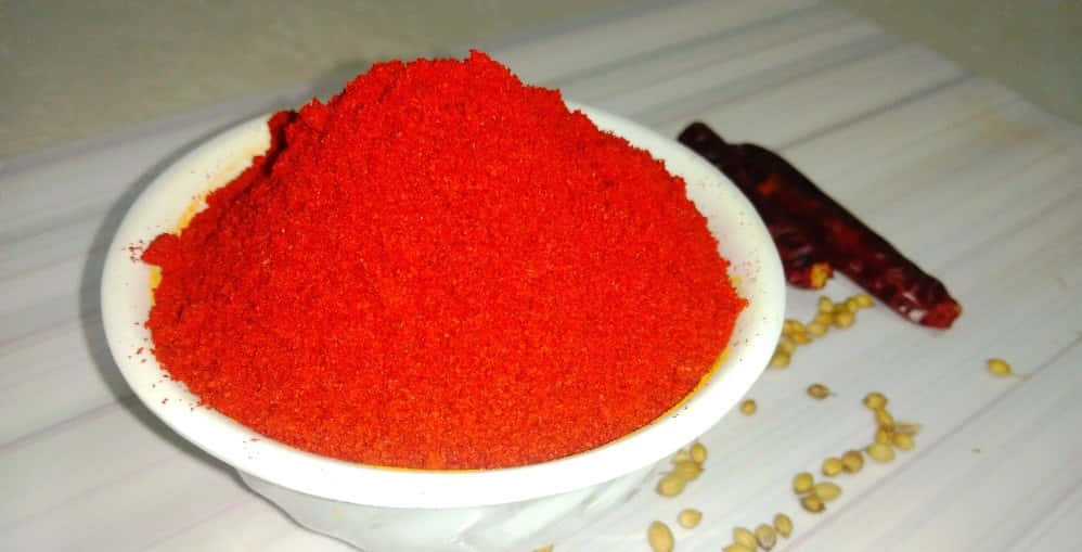 Rich And Vibrant Red Chili Powder Wallpaper