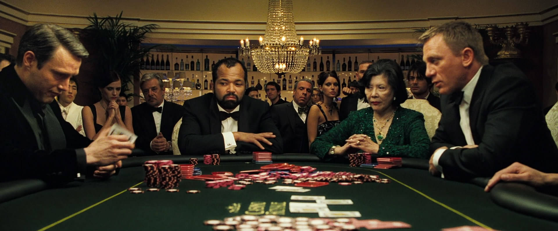 Rich People Playing On Poker Table Wallpaper