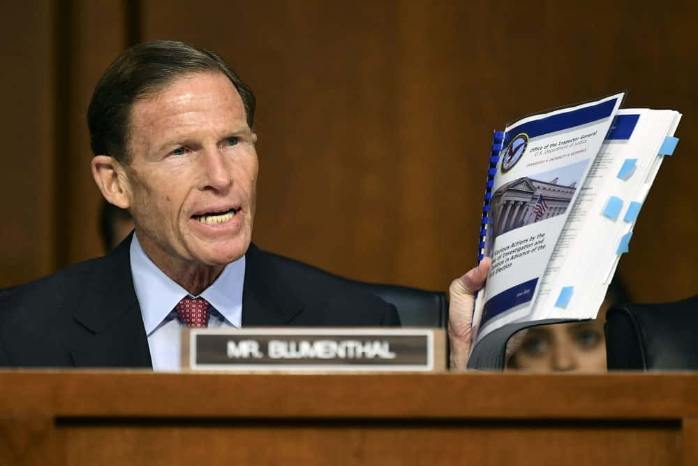 Richard Blumenthal Holding A Book Wallpaper